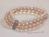 pbr459 Four Rows Nature Color Freshwater Rice Pearl Stretchy Bracelet