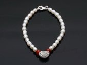 stcbr007 Hand Strung Freshwater Rice Seed Pearl Bracelet with Heart Charm